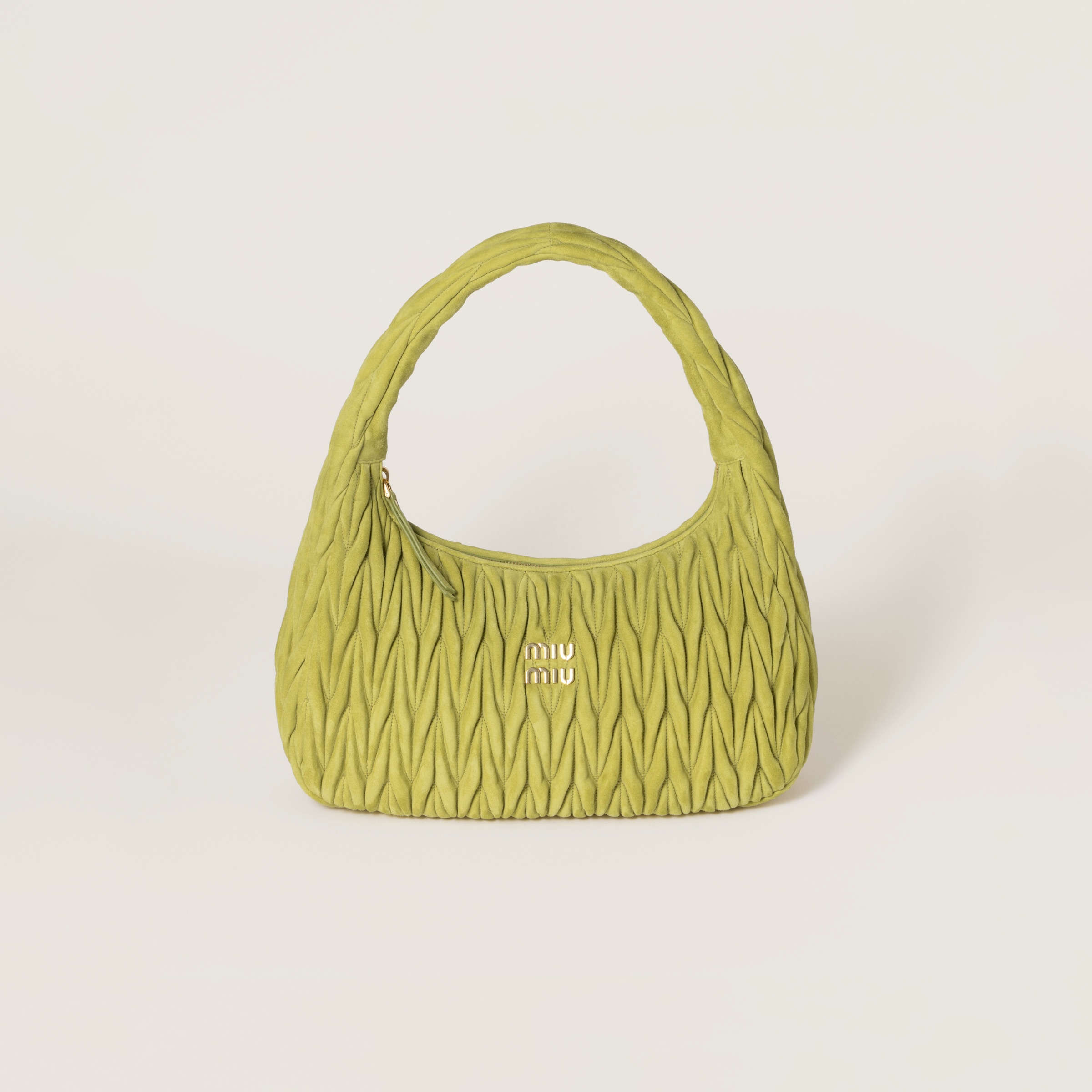 Wander matelassé suede bag