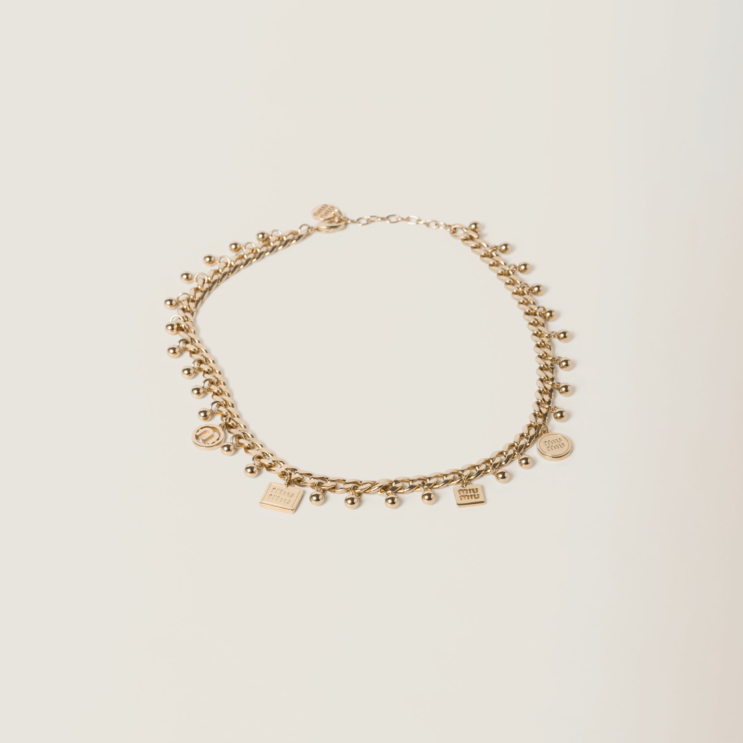 Metal and synthetic pearl necklace