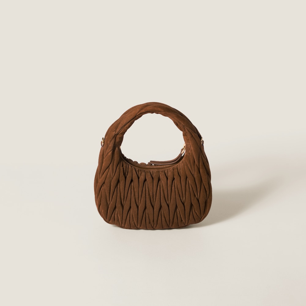 Wander matelassé suede bag