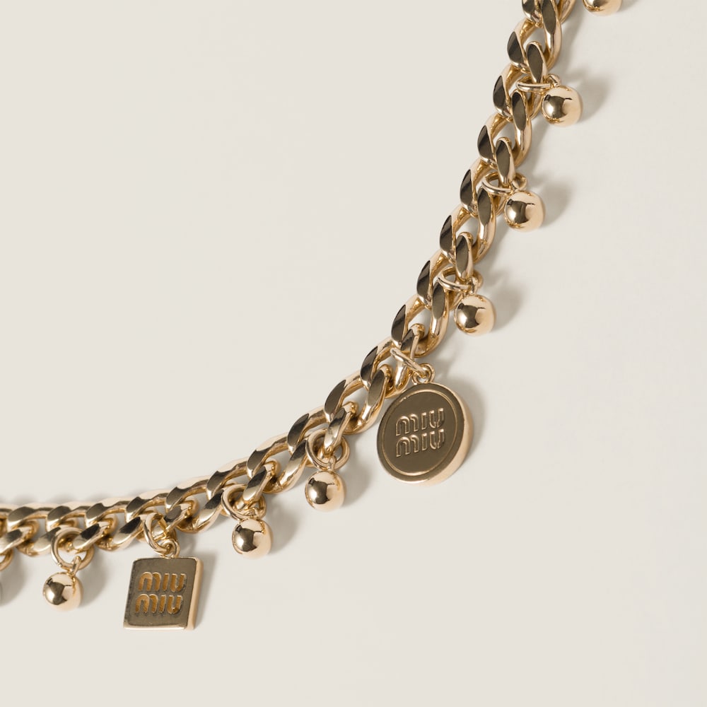 Metal and synthetic pearl necklace