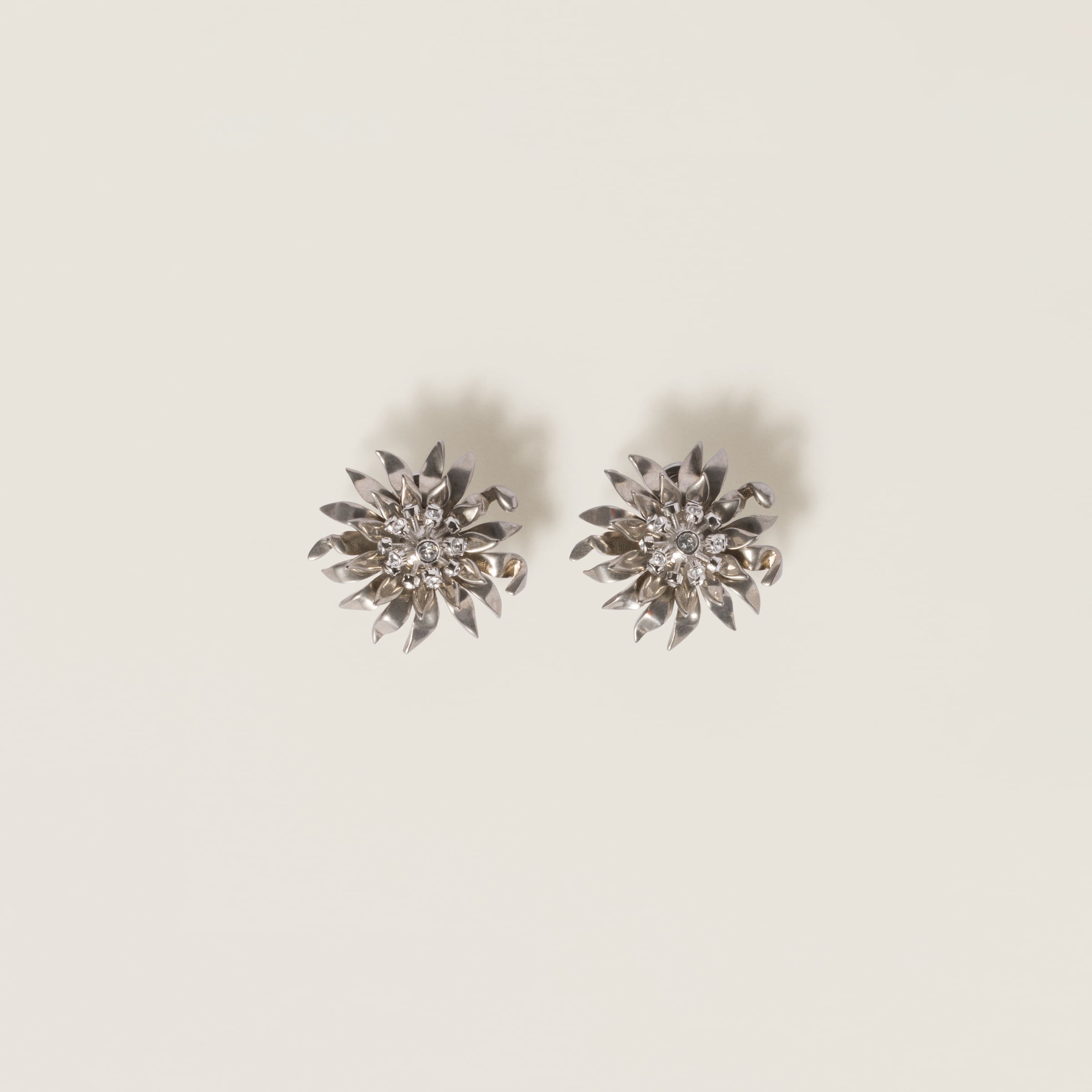 Metal earrings with crystals