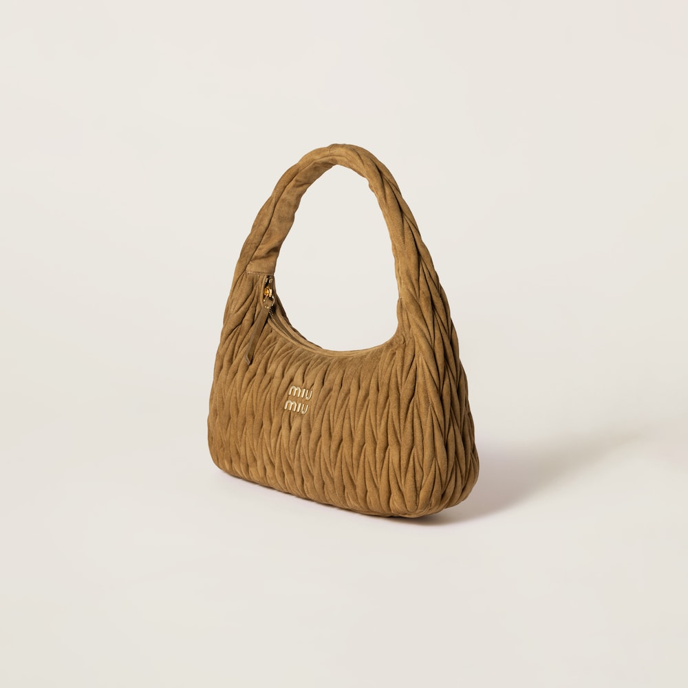 Wander matelassé suede bag