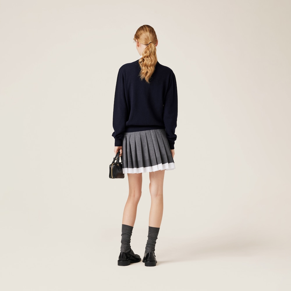 Knit and poplin pleated miniskirt
