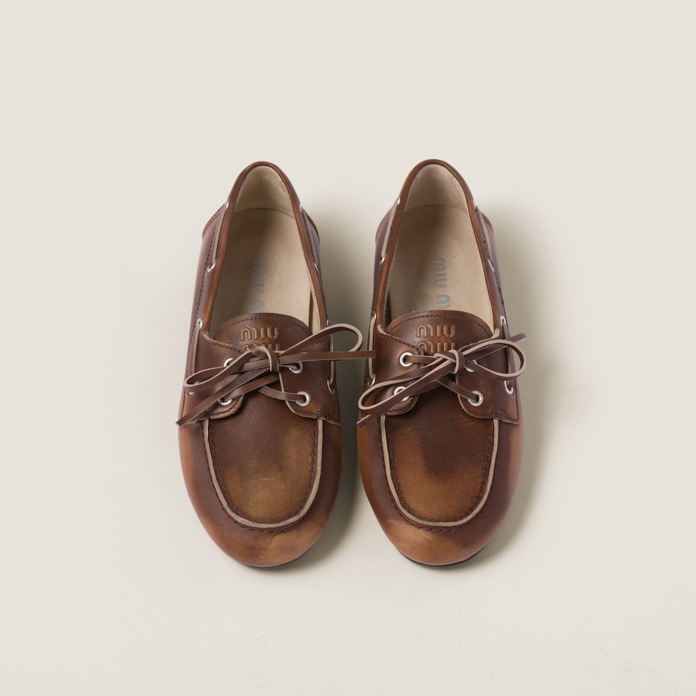 Unlined bleached leather boat shoes