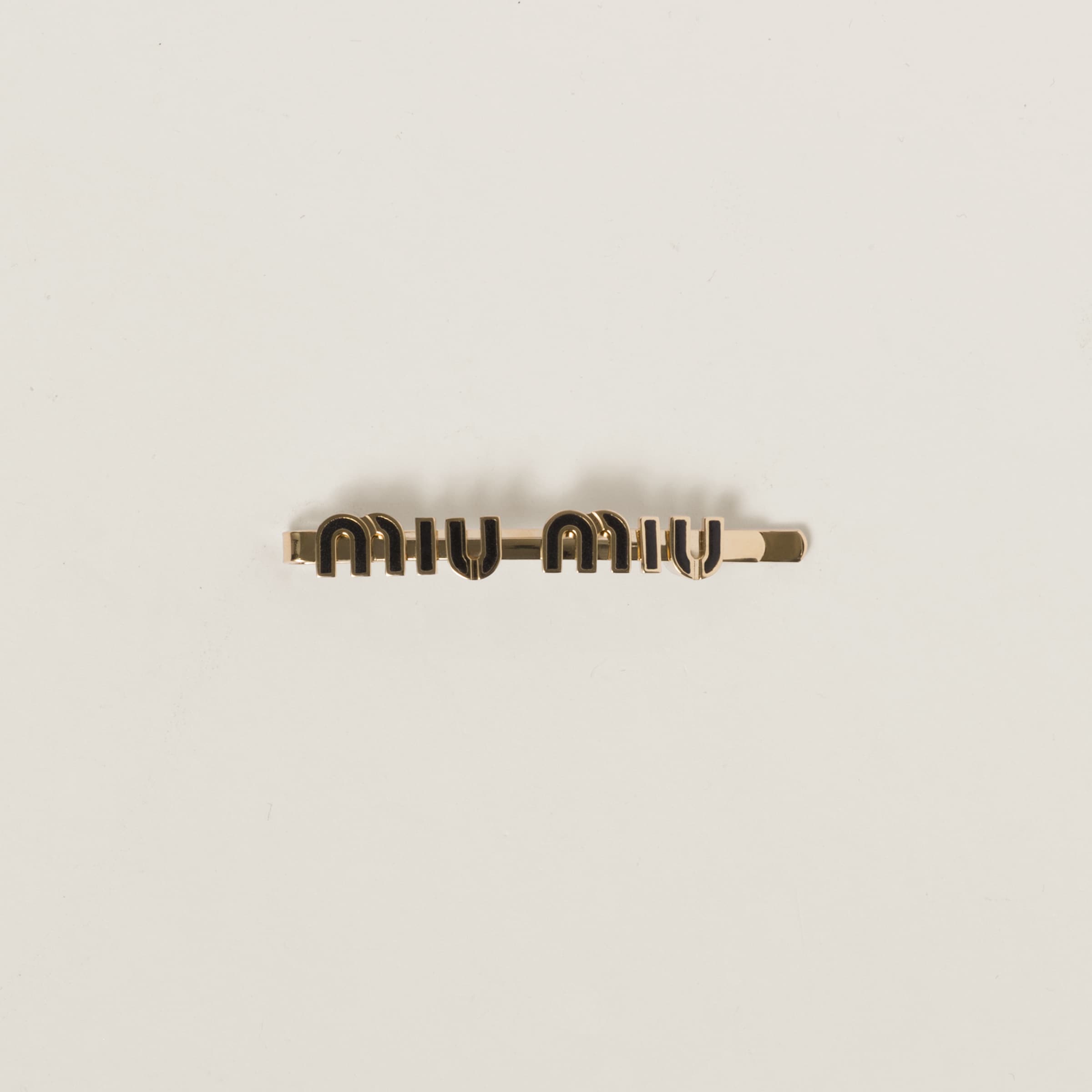 Enameled metal hair clip