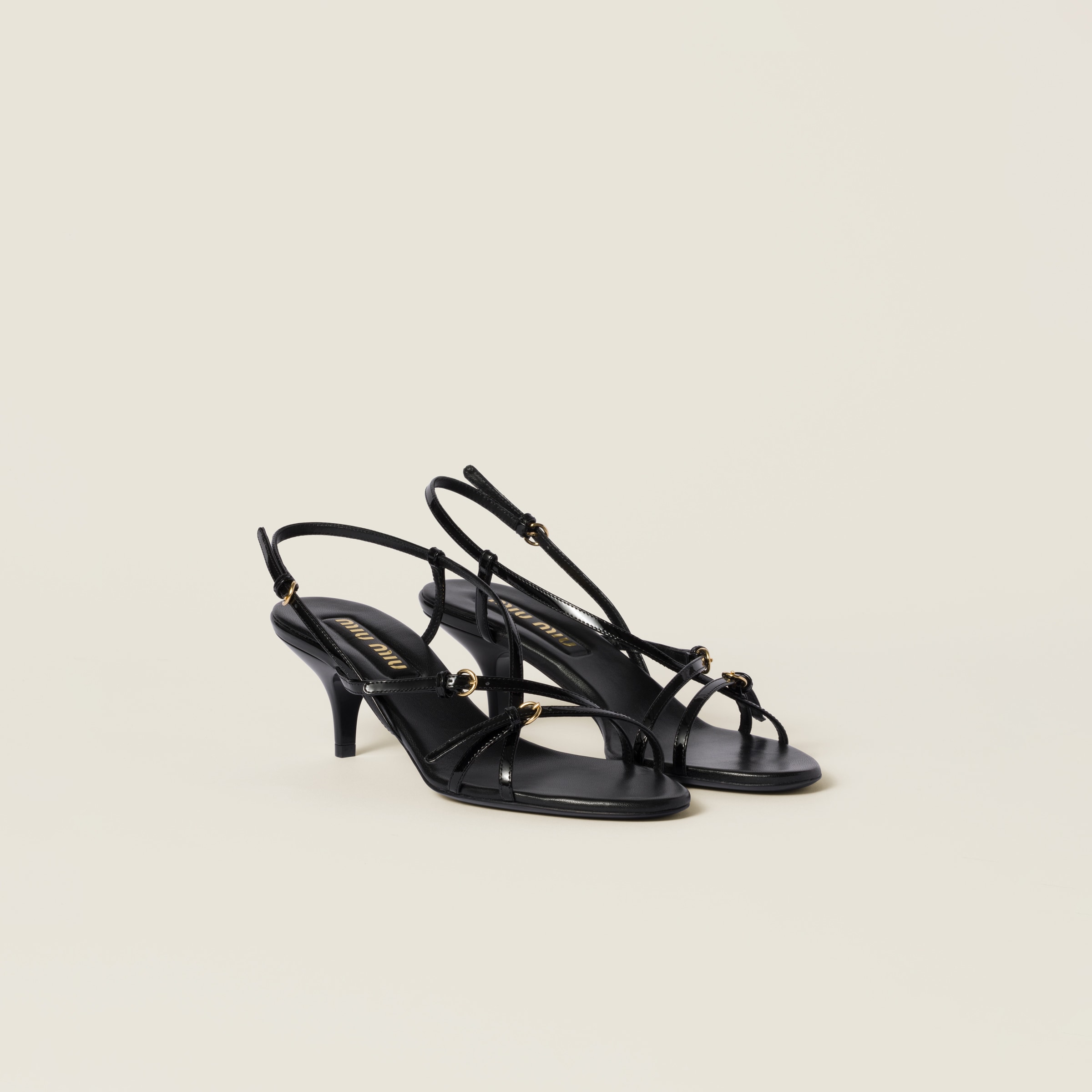 Patent leather sandals with buckles