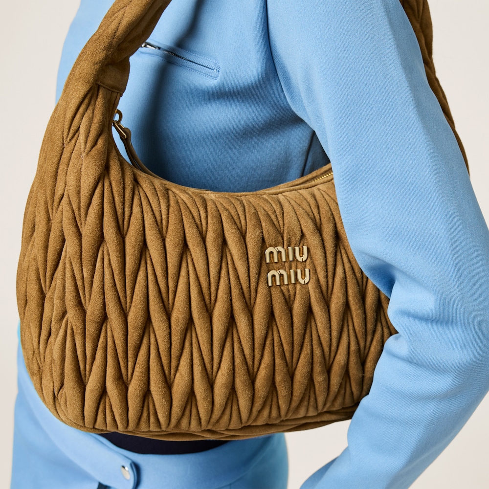 Wander matelassé suede bag
