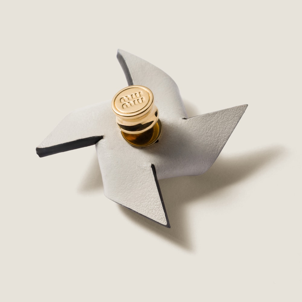 Leather pinwheel brooch