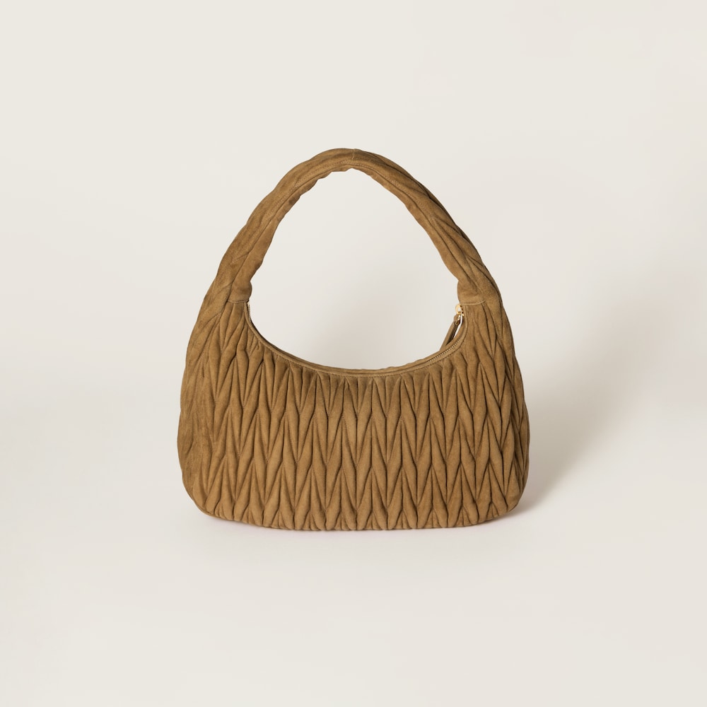 Wander matelassé suede bag