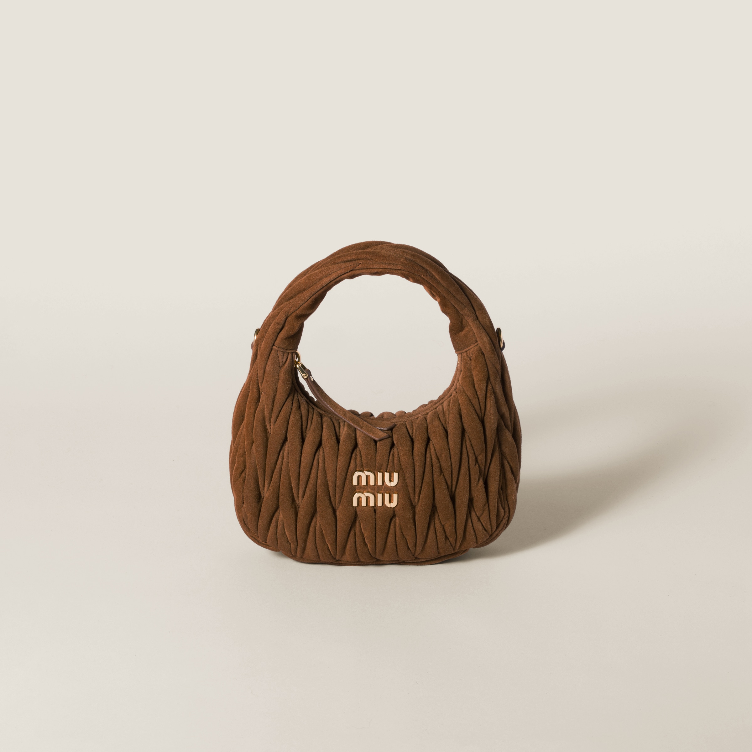 Wander matelassé suede bag
