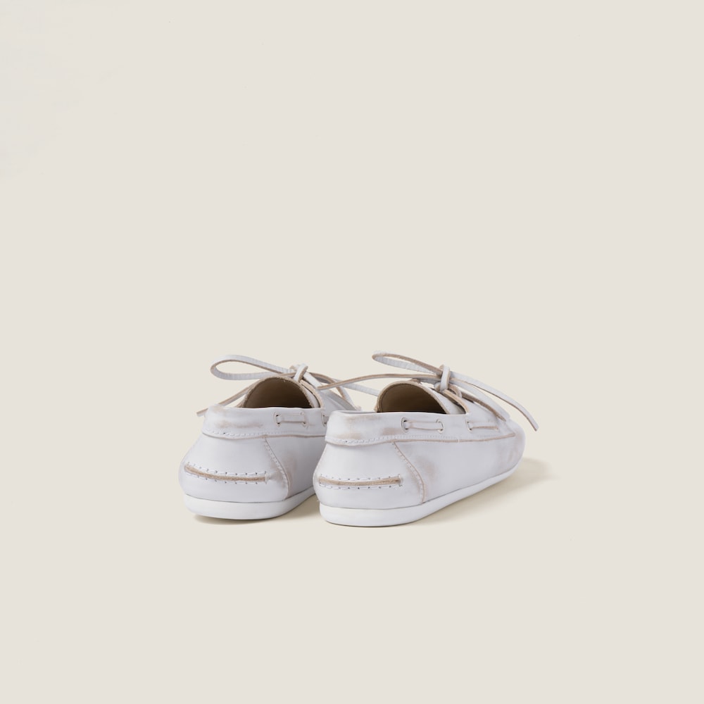 Unlined bleached leather boat shoes