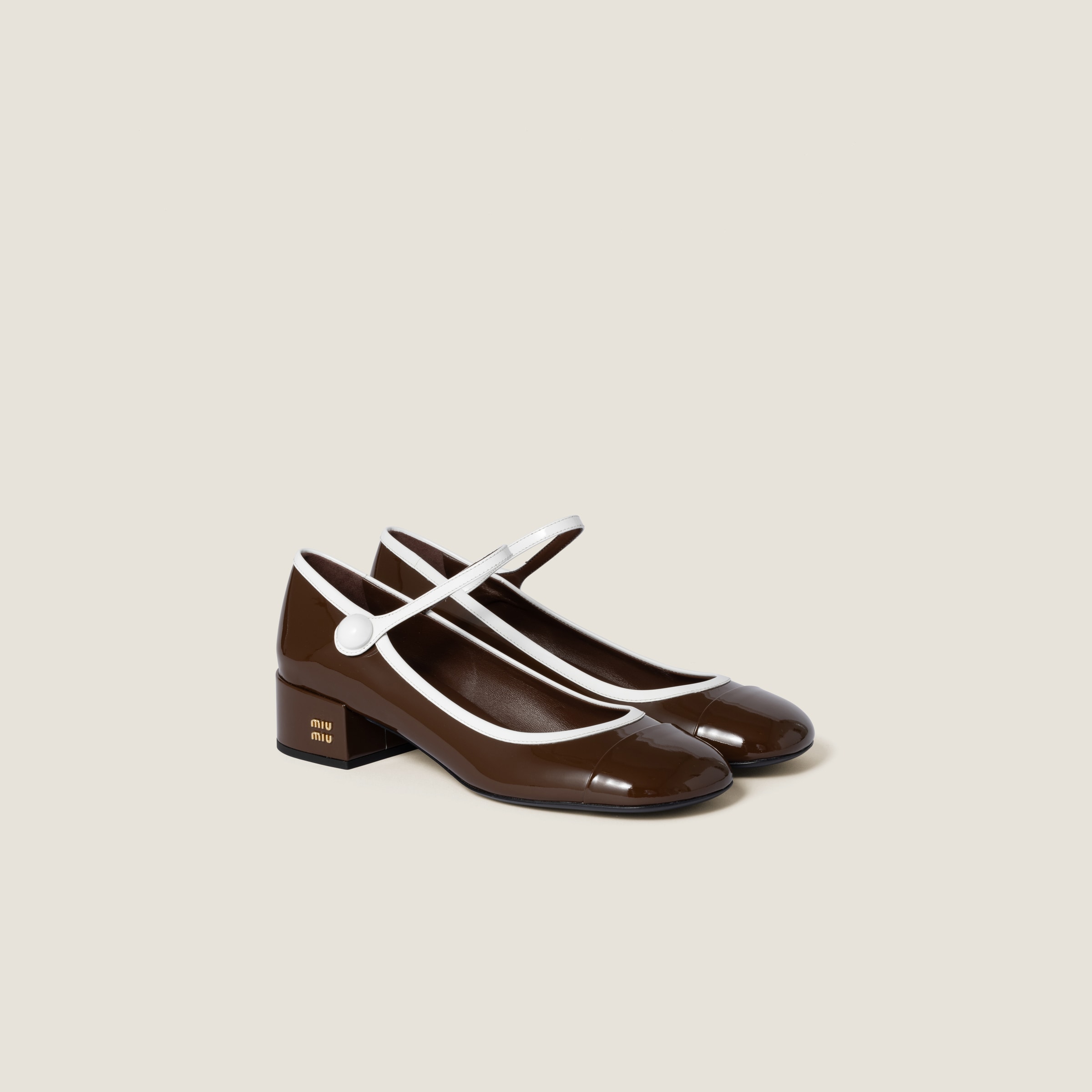 Two-tone patent leather Mary Jane pumps