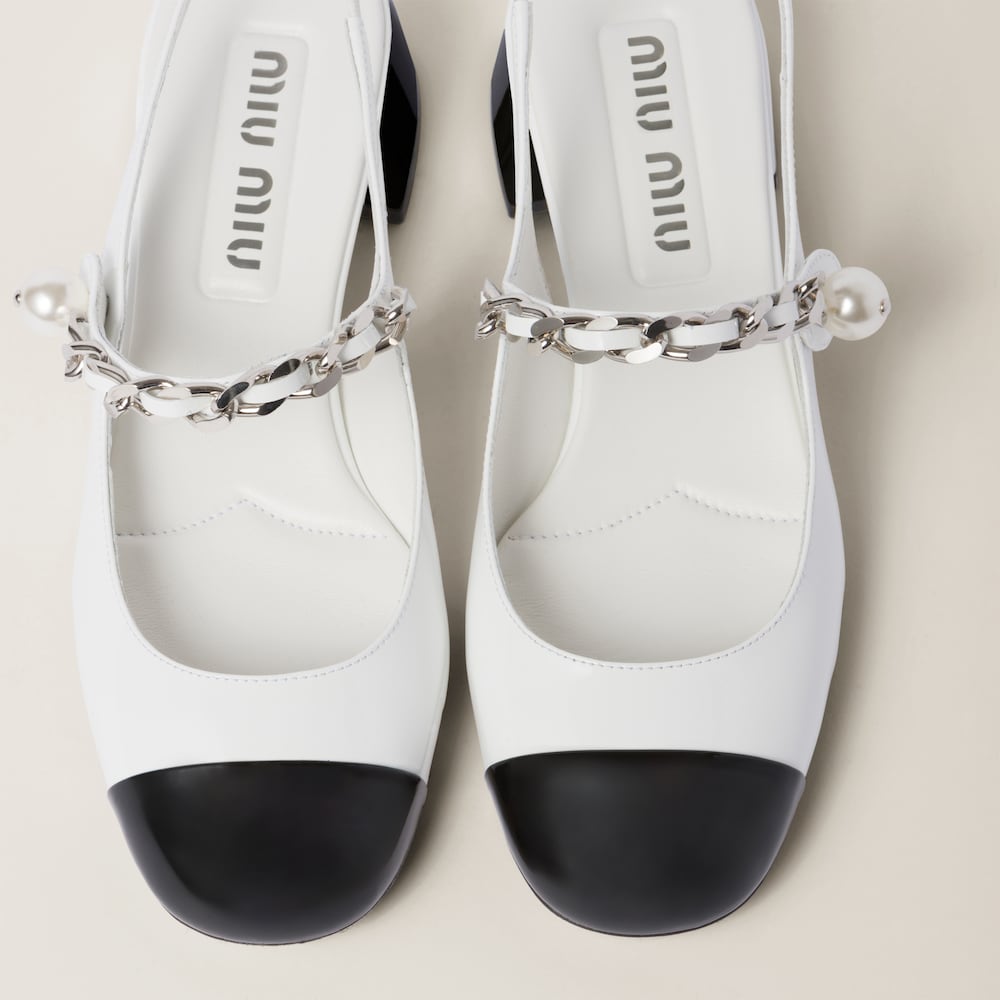 Two-tone patent leather slingback pumps