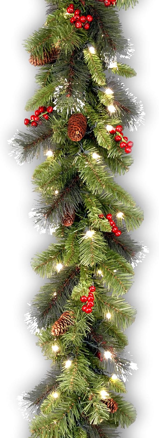 National Tree Company 9 ft Pre-Lit Crestwood Spruce Artificial Christmas Garland, Christmas Decoration with Glitter, Pinecones, Red Berries, 50 Warm White LED Lights, 180 Tips, Timer, Green