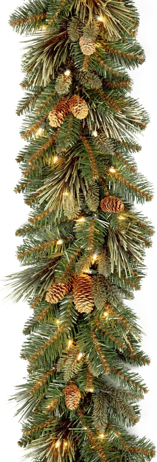 National Tree Company 9 ft Pre-Lit Carolina Pine Artificial Christmas Garland, Christmas Decoration with Pinecones, 100 Clear Lights, 240 Tips, Green