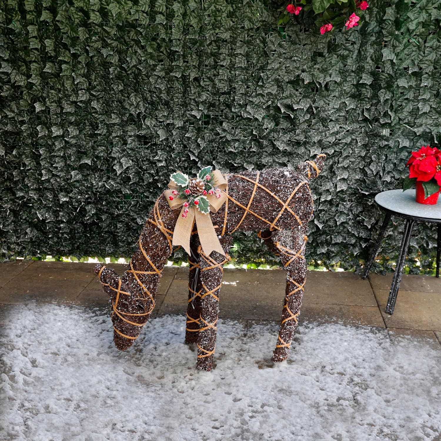 Alpine Corporation 24 Tall Outdoor Rattan Grazing Reindeer Lawn Decoration with White LED Lights, Christmas Yard Decor, Holiday Garden Display