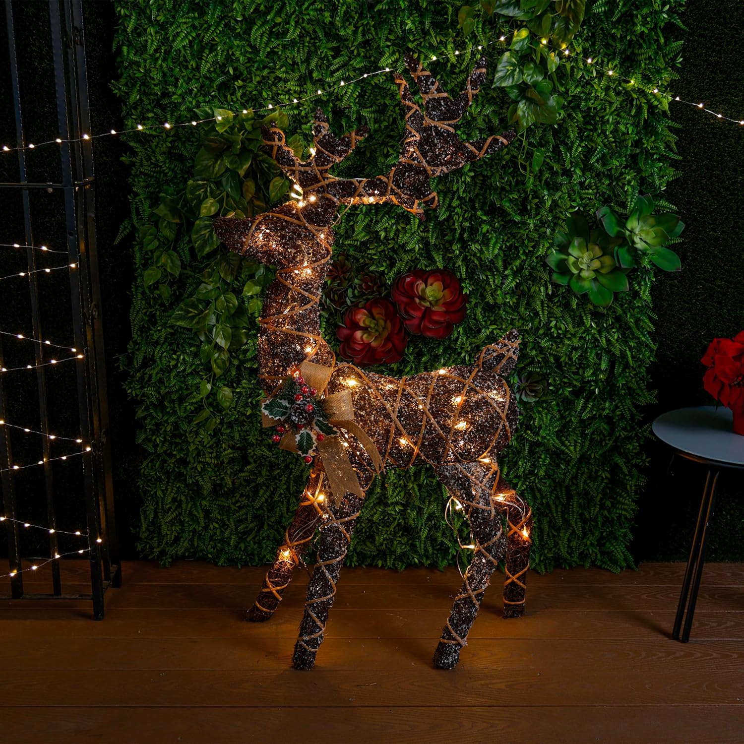 Alpine Corporation 24 Tall Outdoor Rattan Grazing Reindeer Lawn Decoration with White LED Lights, Christmas Yard Decor, Holiday Garden Display