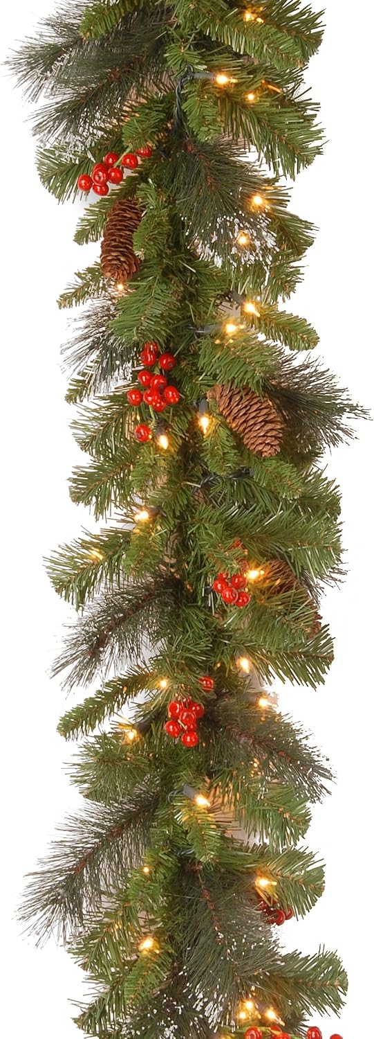 National Tree Company 9 ft Pre-Lit Crestwood Spruce Artificial Christmas Garland, Christmas Decoration with Glitter, Pinecones, Red Berries, 50 Warm White LED Lights, 180 Tips, Timer, Green