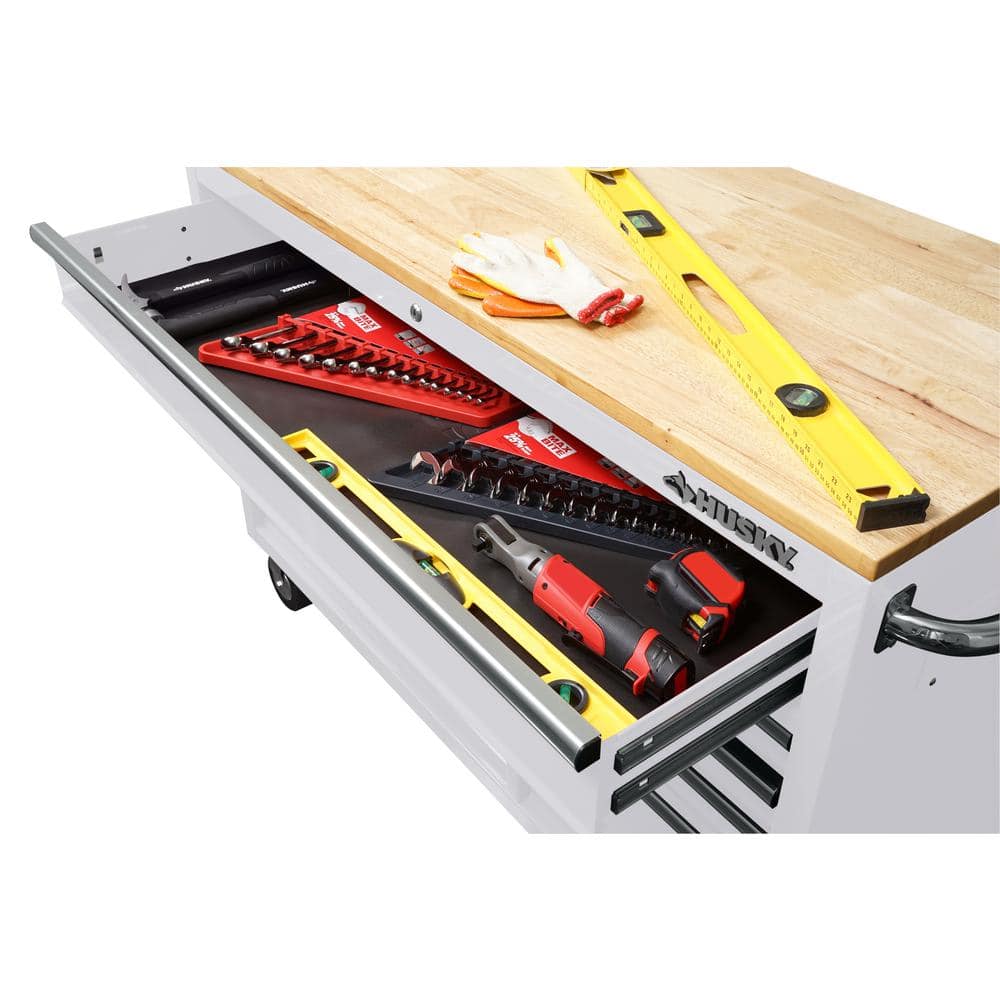 52 in. W x 24 5 in. D 9 Drawer Standard Duty Mobile Workbench Tool Chest with Solid Work Top and Pegboard in. Gloss White