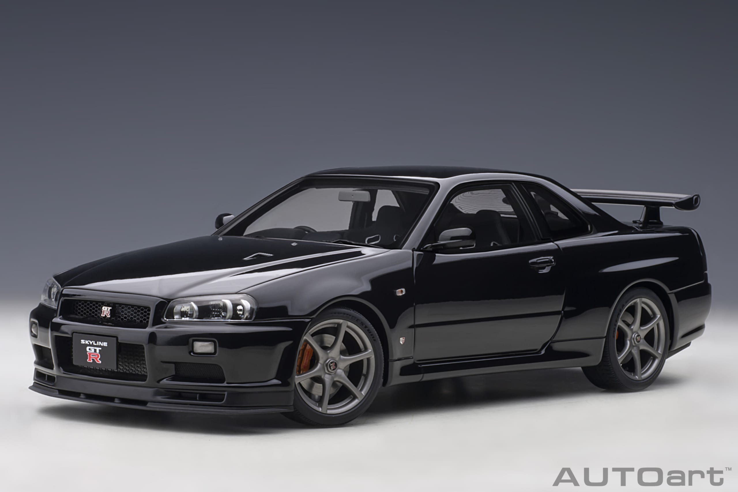 AUTOart 1:18 Nissan Skyline GT-R (R34) V-spec II (Black Pearl) 77407