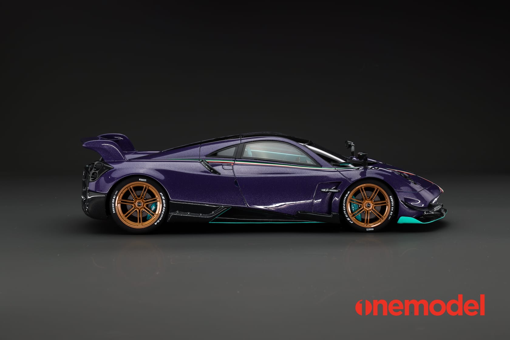 One Model 1:18 Pagani Hyuara BC in Carbon Purple with Tiffany Blue Accents