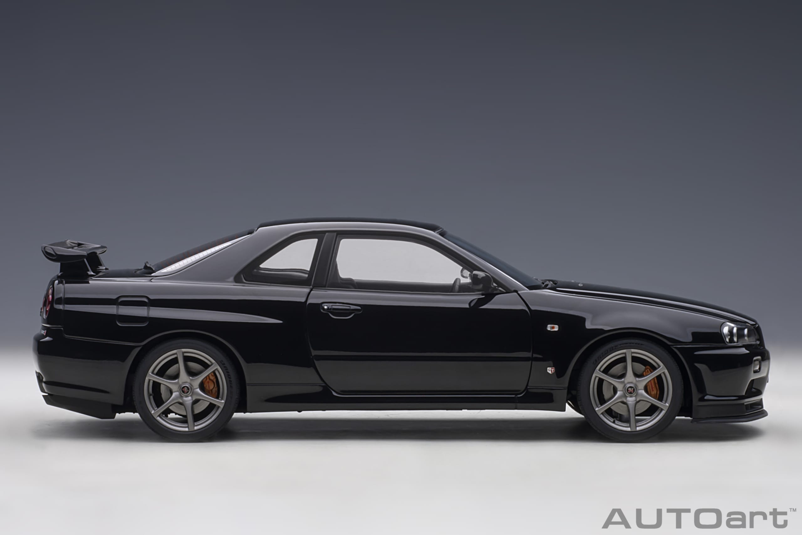 AUTOart 1:18 Nissan Skyline GT-R (R34) V-spec II (Black Pearl) 77407
