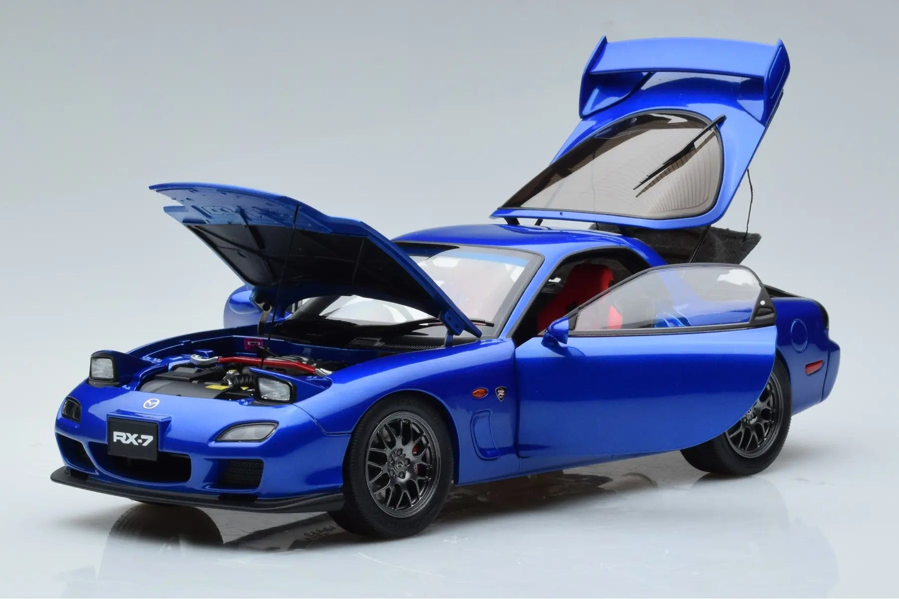 Polar Master 1:18 Mazda RX-7 (FD3S) Spirit R in Metallic Blue with Engine Display