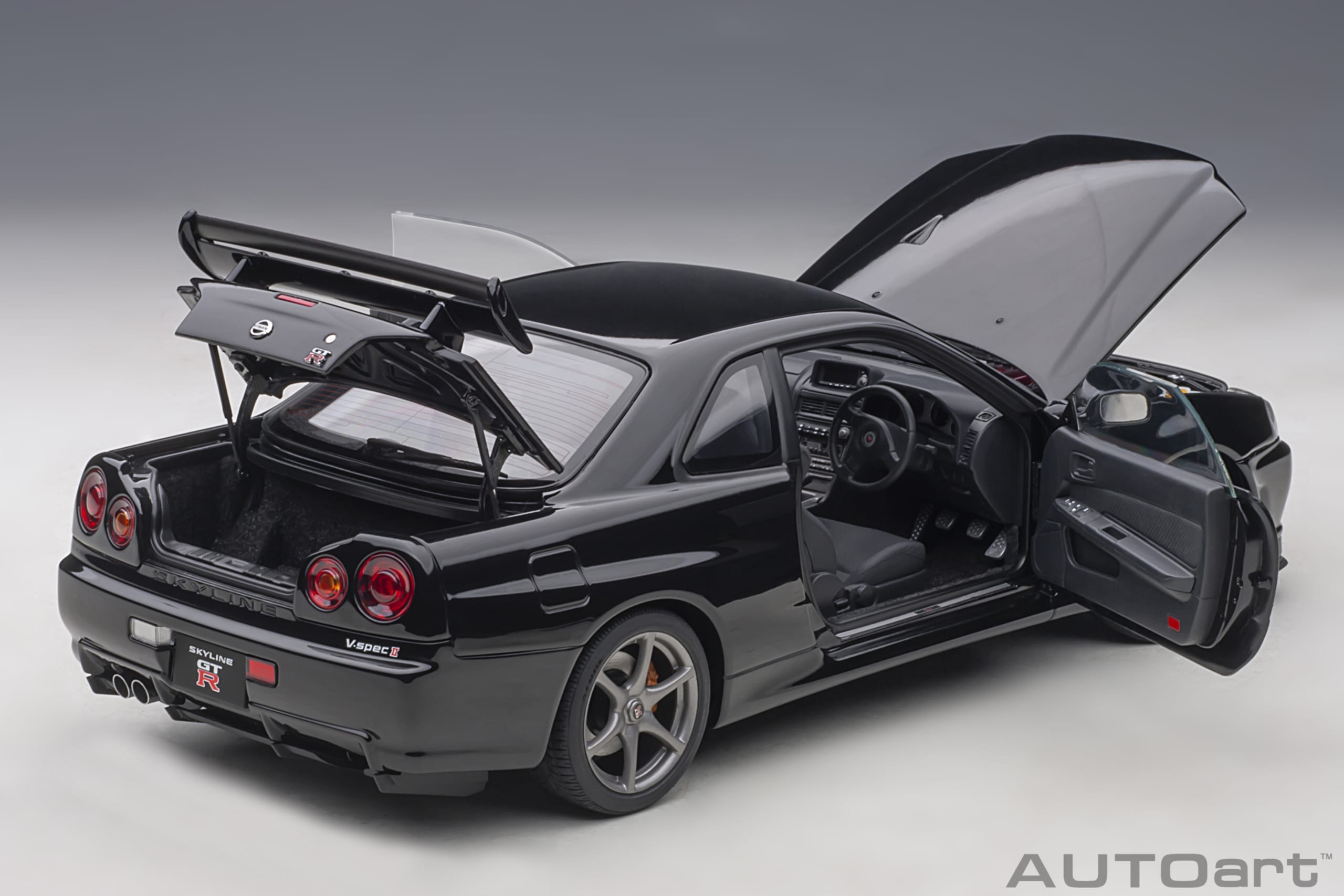 AUTOart 1:18 Nissan Skyline GT-R (R34) V-spec II (Black Pearl) 77407