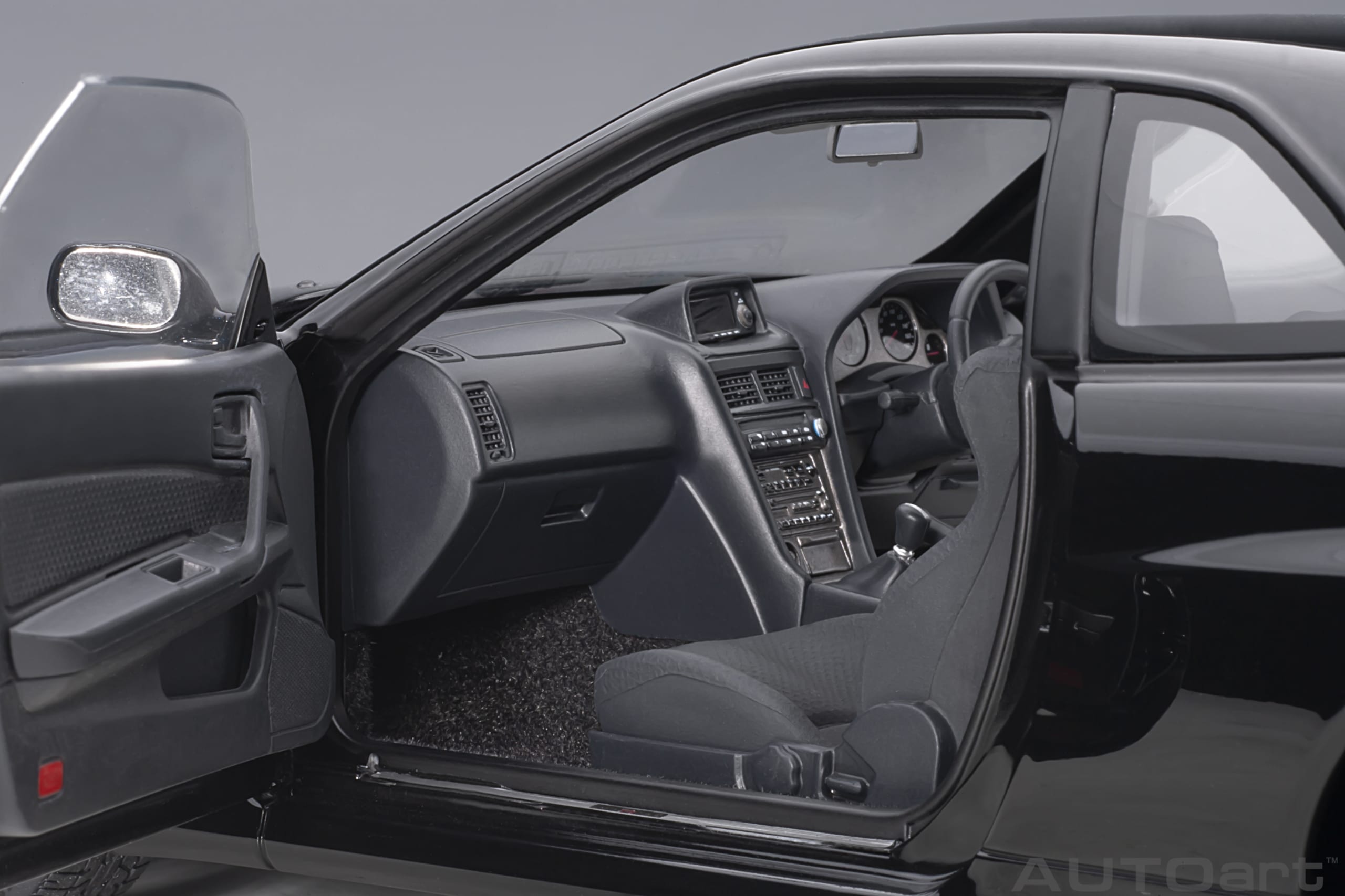 AUTOart 1:18 Nissan Skyline GT-R (R34) V-spec II (Black Pearl) 77407