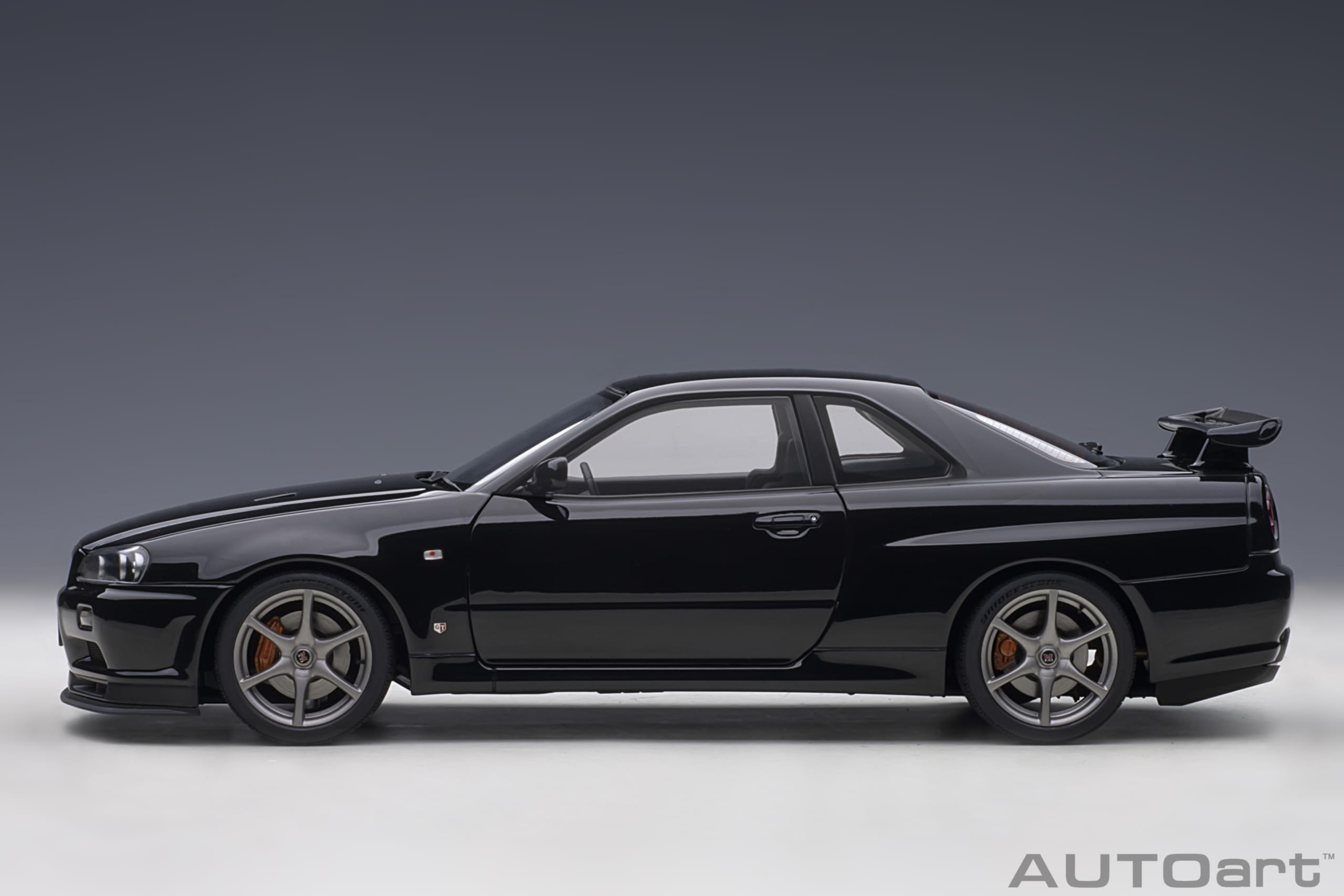 AUTOart 1:18 Nissan Skyline GT-R (R34) V-spec II (Black Pearl) 77407