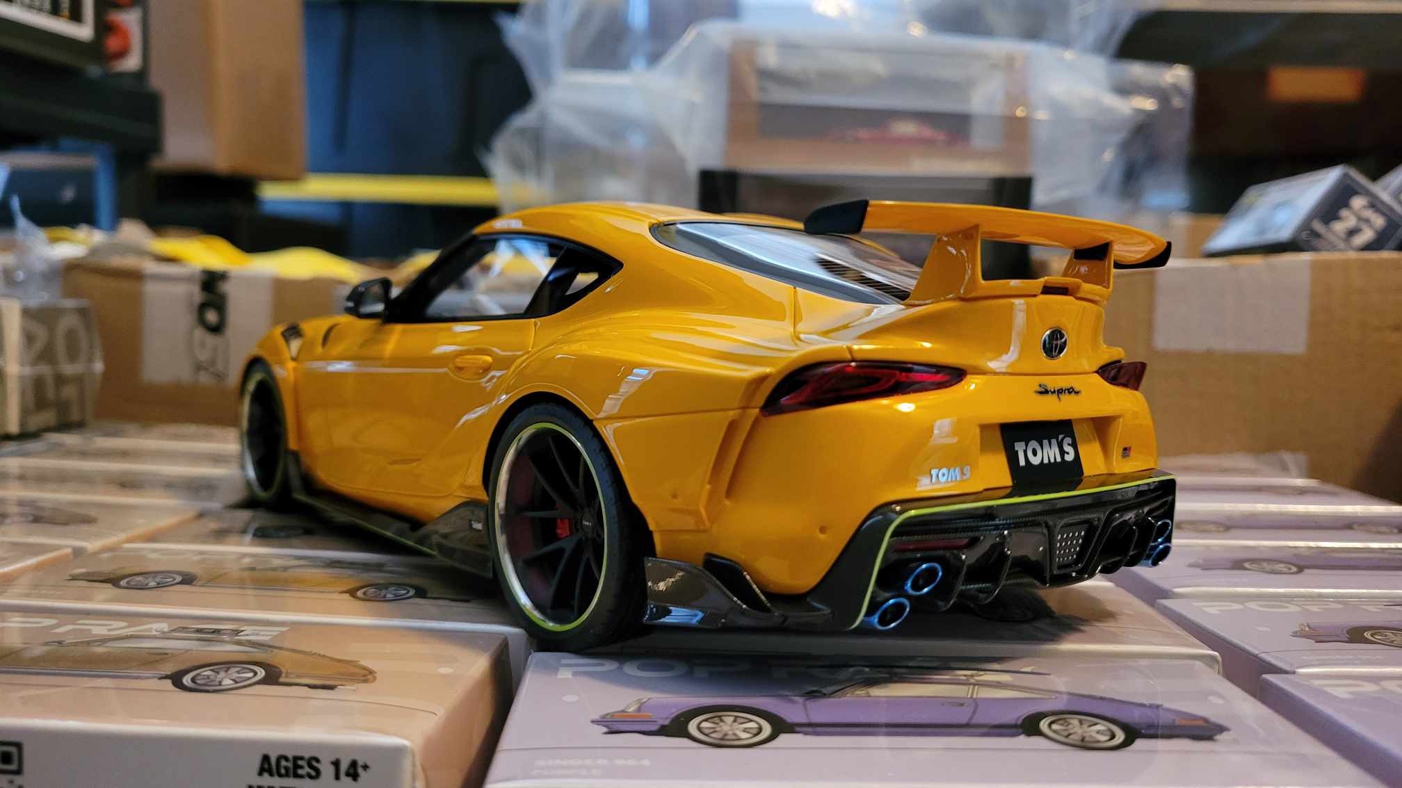 Make Up Co., Ltd / IDEA 1:18 Toyota GR Supra TOM'S Edition 2020 in Lightning Yellow (OPEN BOX ITEM)