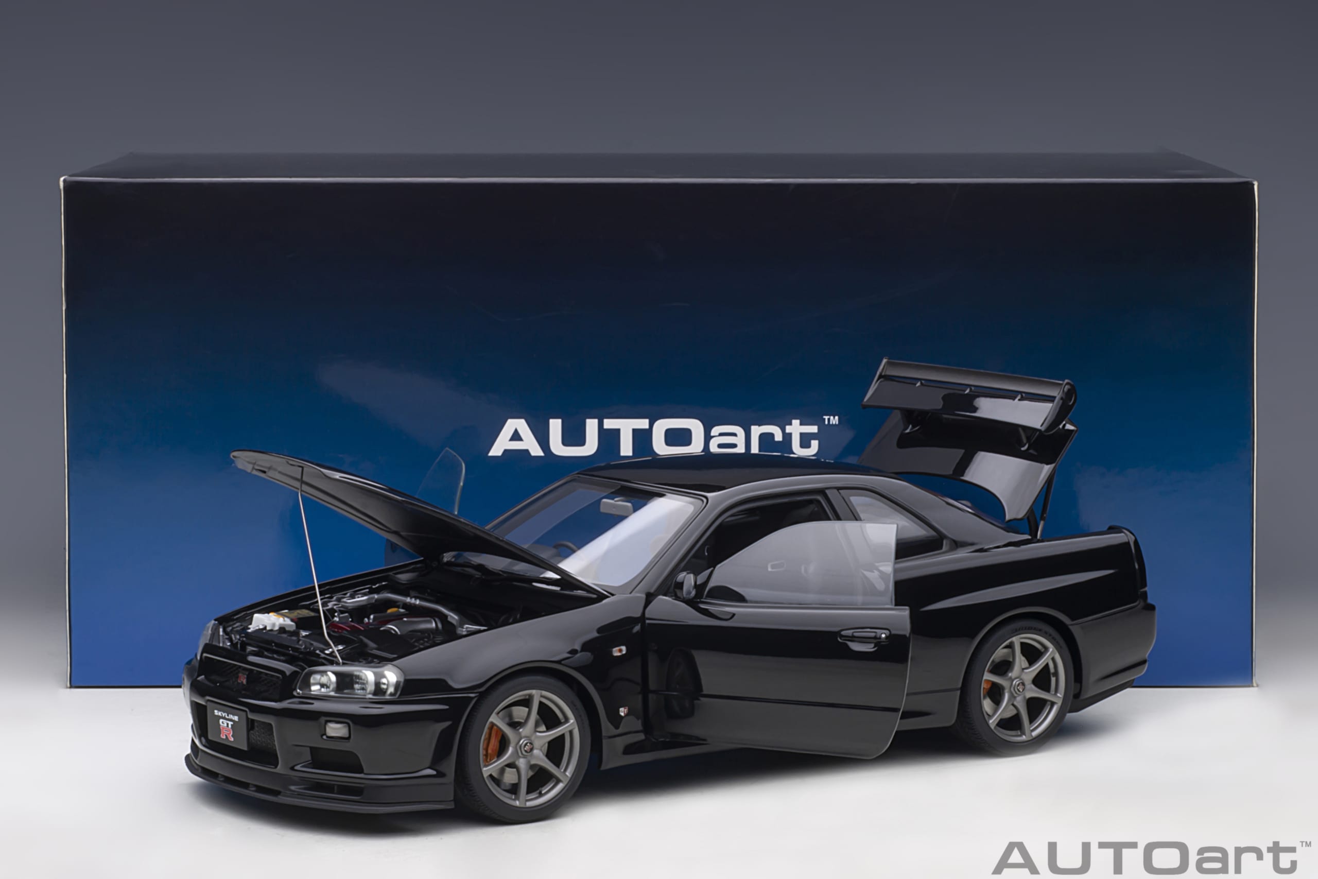 AUTOart 1:18 Nissan Skyline GT-R (R34) V-spec II (Black Pearl) 77407