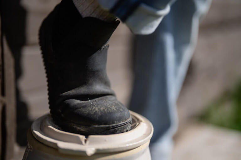 A full leather boot flexing and showing how the leather ages