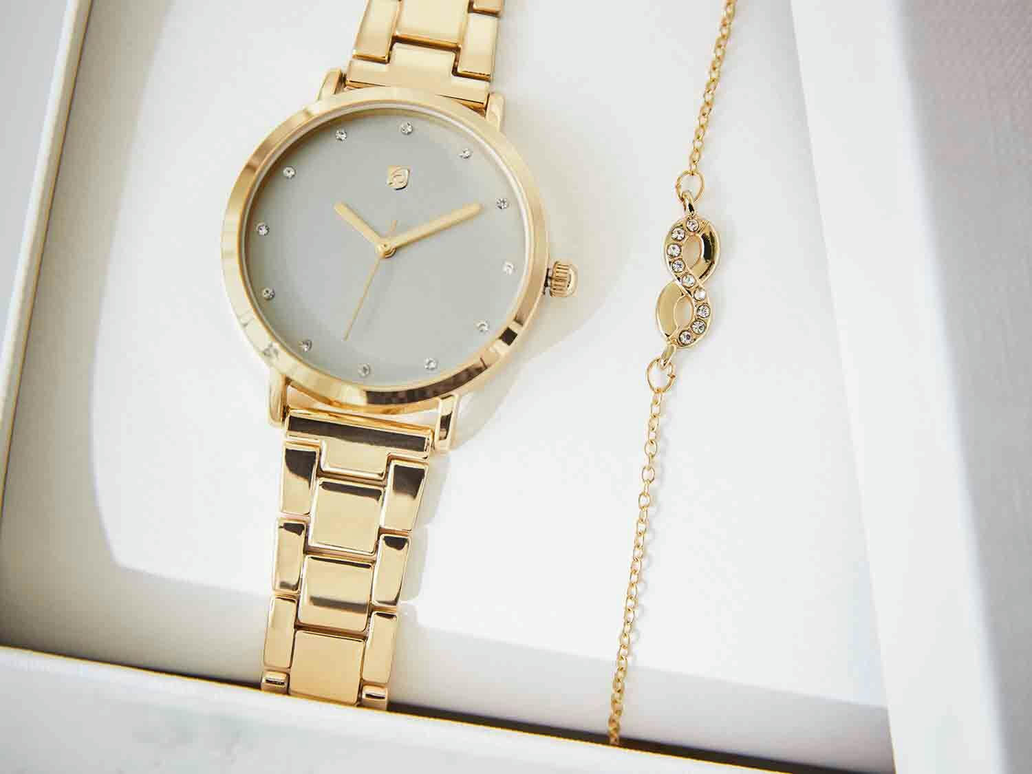 Set de reloj dorado y pulsera
