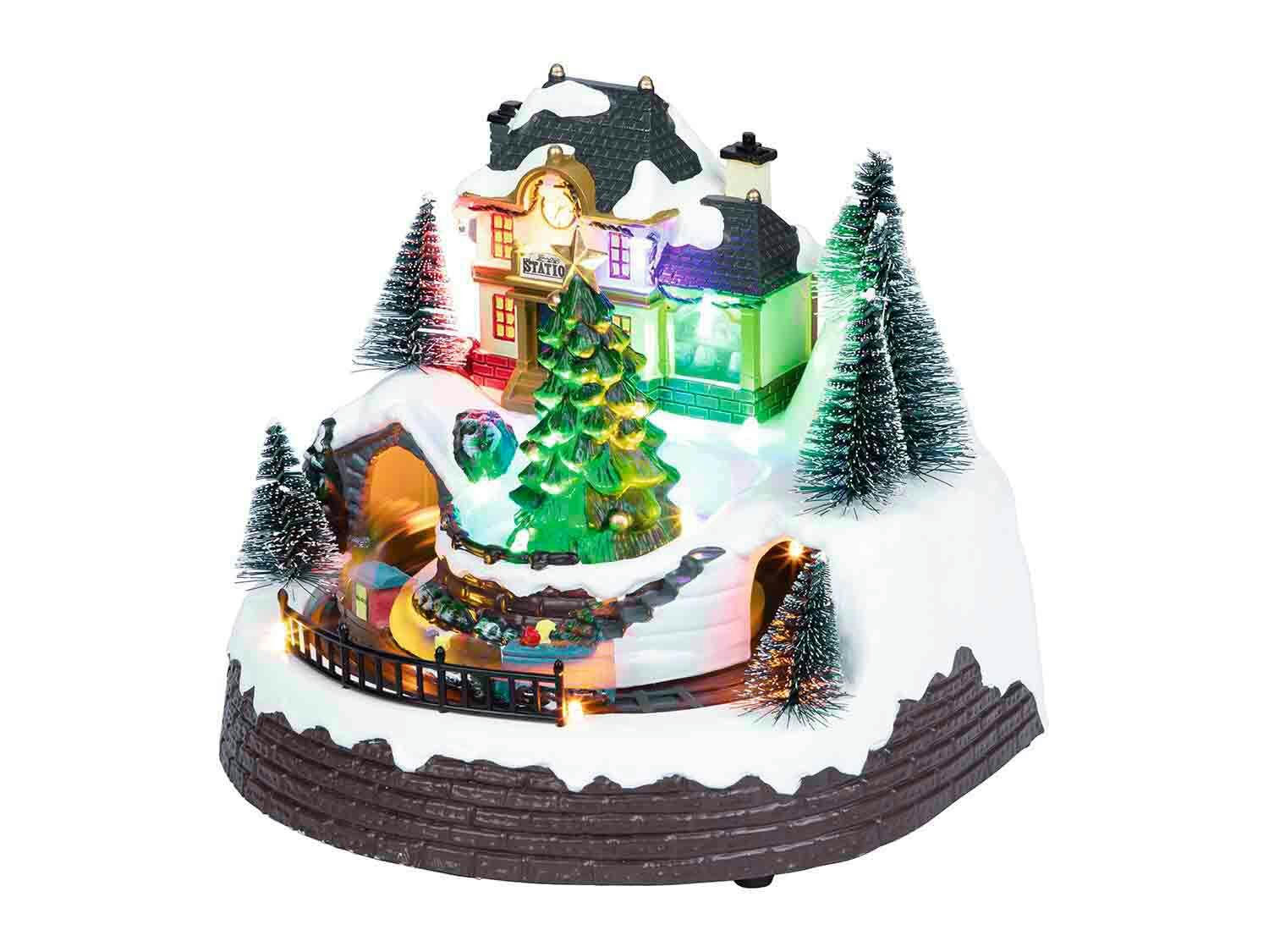Pueblo navideño con 12 LEDS con ferrocarril