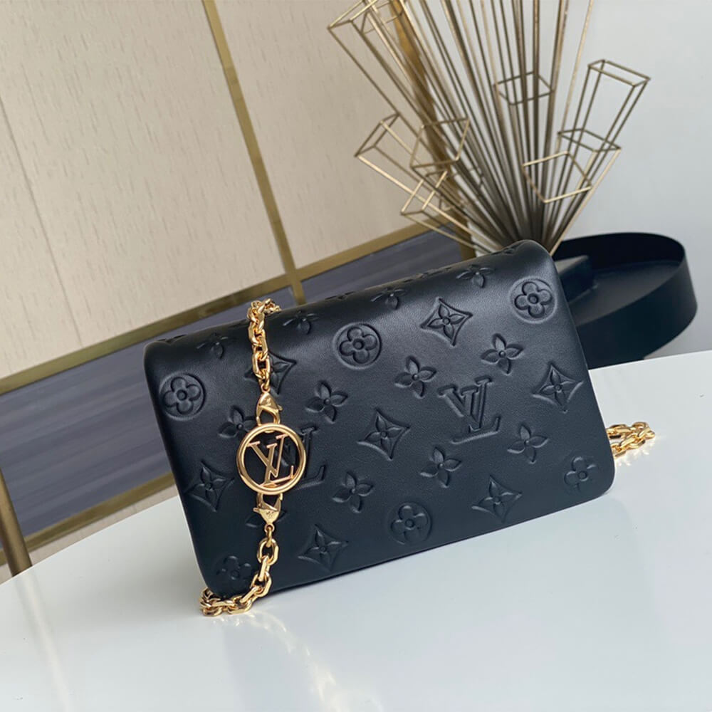 Louis Vuitton POCHETTE COUSSIN