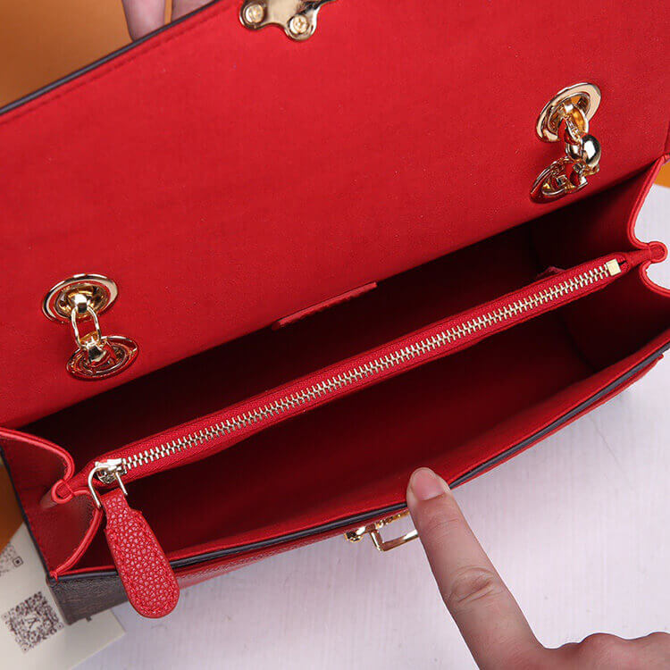 Louis Vuitton Victoire Handbag
