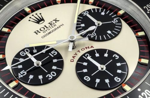 daytona paul newman wall clock black logo