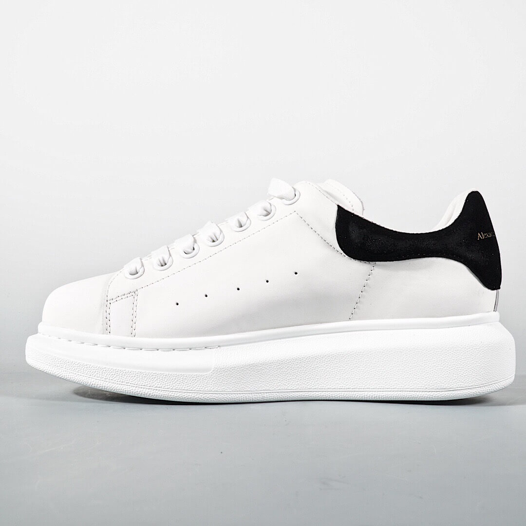 ALEXANDER MCQUEEN SUEDE-TRIMMED LEATHER EXAGGERATED-SOLE SNEAKERS-BLACK