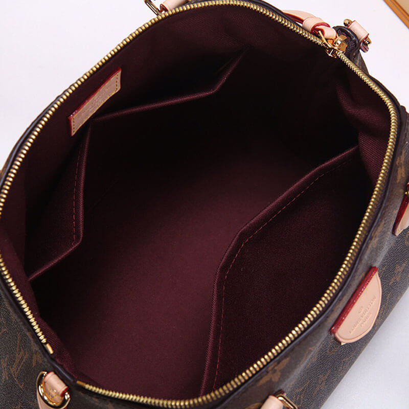 Louis Vuitton Rivoli MM Handbag