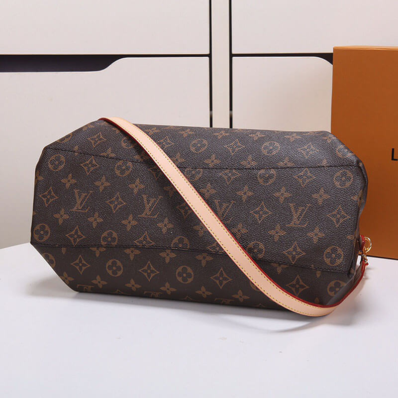 Louis Vuitton Rivoli MM Handbag