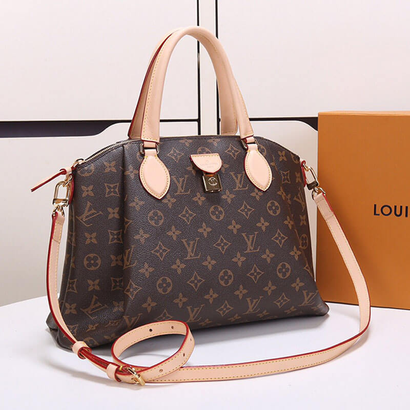 Louis Vuitton Rivoli MM Handbag