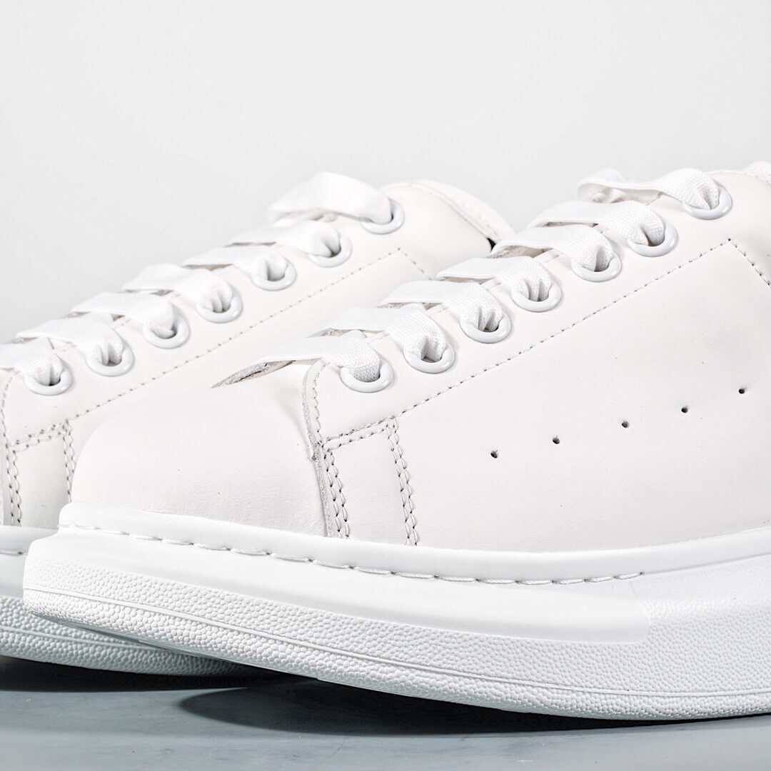 ALEXANDER MCQUEEN SUEDE-TRIMMED LEATHER EXAGGERATED-SOLE SNEAKERS-BLACK