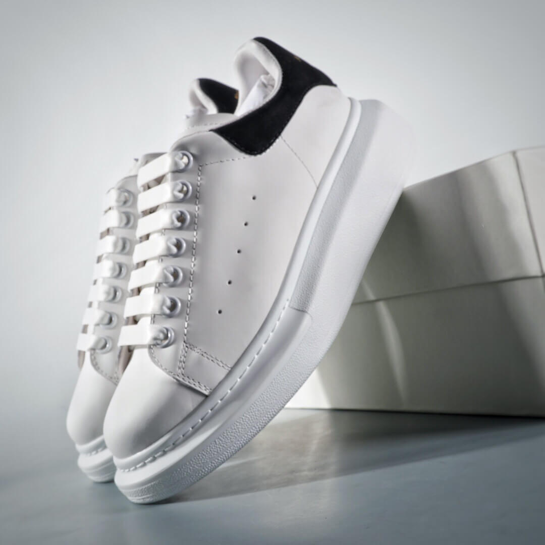 ALEXANDER MCQUEEN SUEDE-TRIMMED LEATHER EXAGGERATED-SOLE SNEAKERS-BLACK