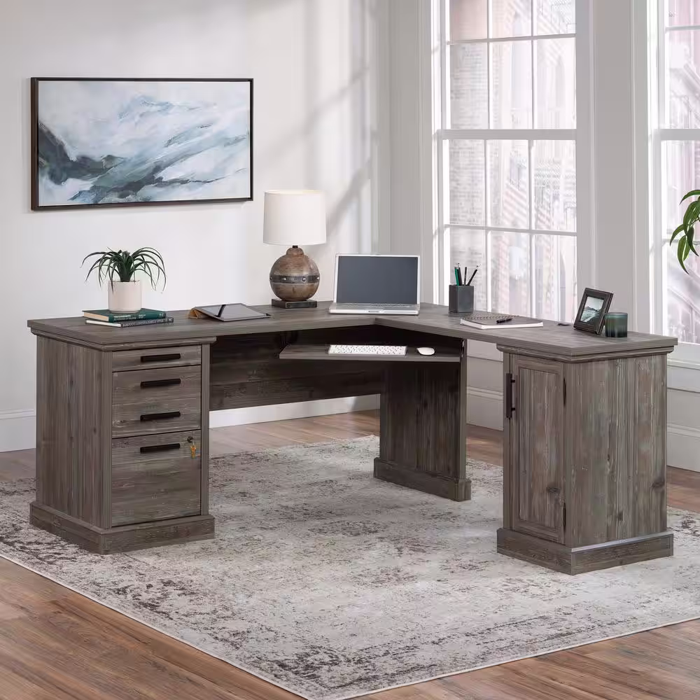 SAUDER Aspen Post 65.118 in. L-Shaped Pebble Pine 3-Drawer Computer Desk with Keyboard Shelf and Cord Management
