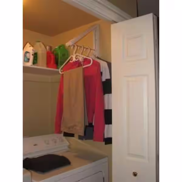 InstaHANGER White ABS Plastic Collapsible Wall Mounted Clothes Hanging System