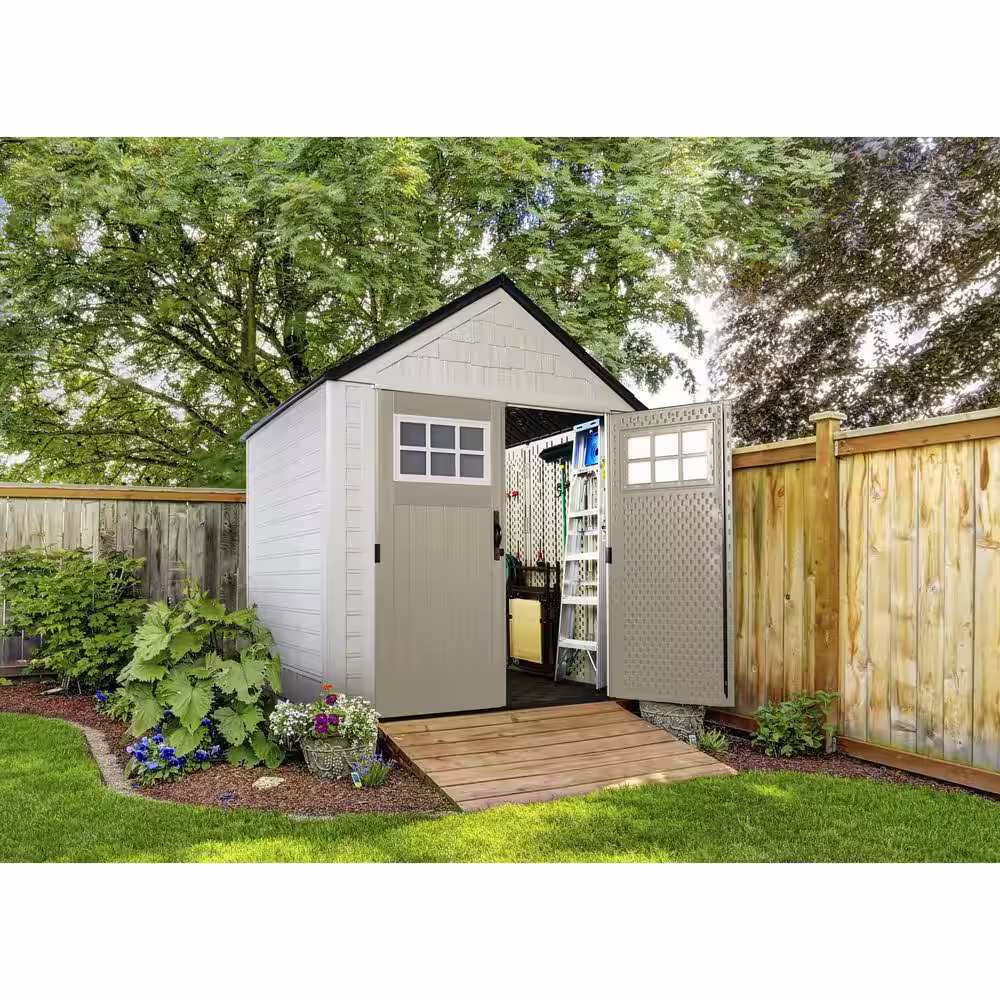 Rubbermaid 7 ft. W x 7 ft. D Durable Weather Resistant Plastic Outdoor Storage Shed, Sand 0.58 sq. ft.