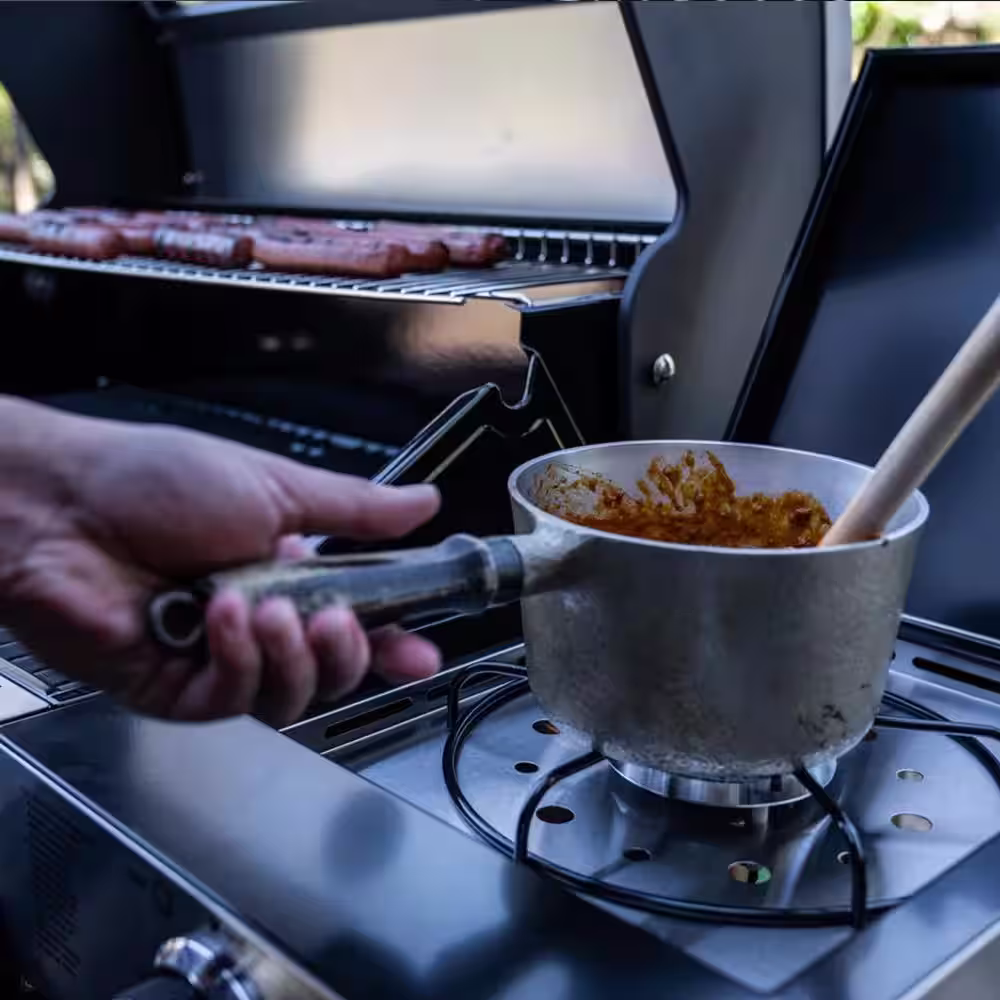 Monument Grills 4-Burner Propane Gas Grill in Black with ClearView Lid, LED Controls, Side Burner and USB Light