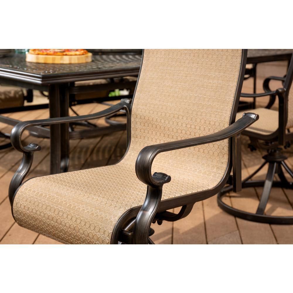 Hanover Brigantine 9-Piece Aluminum Outdoor Dining Set with an XL Cast-Top Table and 8-Slingback Swivel Rockers