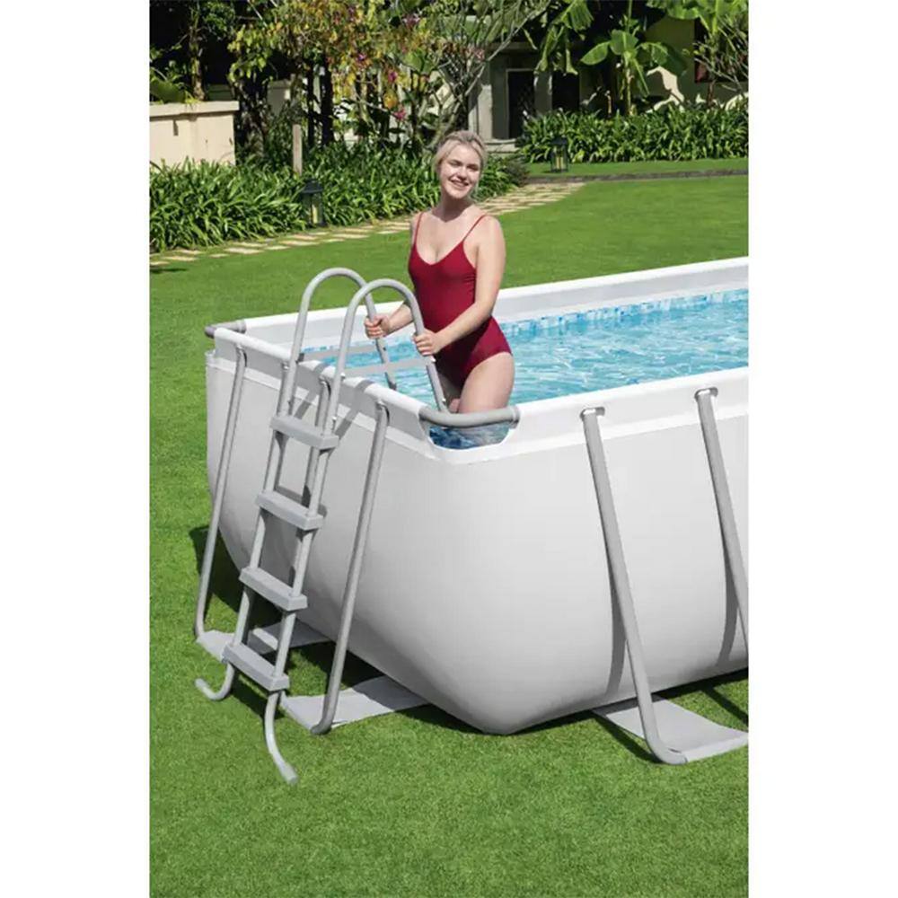 Bestway 18 ft. x 9 ft. x 48 in. Rectangular Above Ground Swimming Pool with Accessories